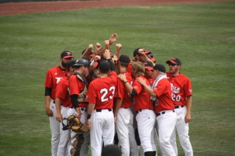 jucofirstwin1 (2) The Polk State Eagles huddle before taking the field against Western Nevada during the first round of the NJCAA JuCo World Series.